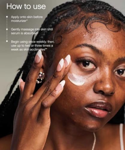 Applying Topicals Faded Serum to skin for even tone and texture.