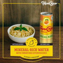 Topo Chico Flavors Tropical Mango glass with ice, cooling refreshment on hot days