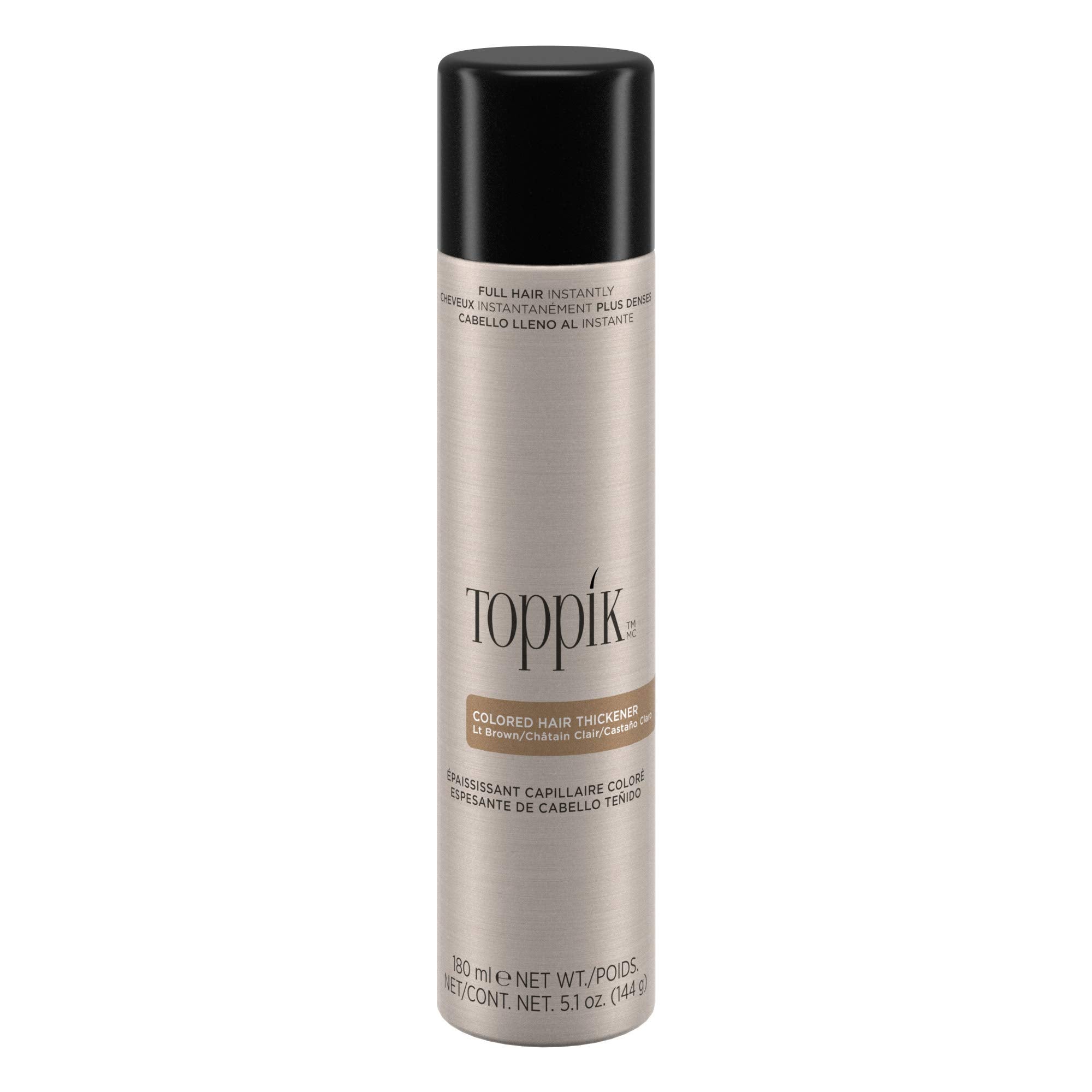 TOPPIK colored hair thickener spray in light brown for fuller roots.