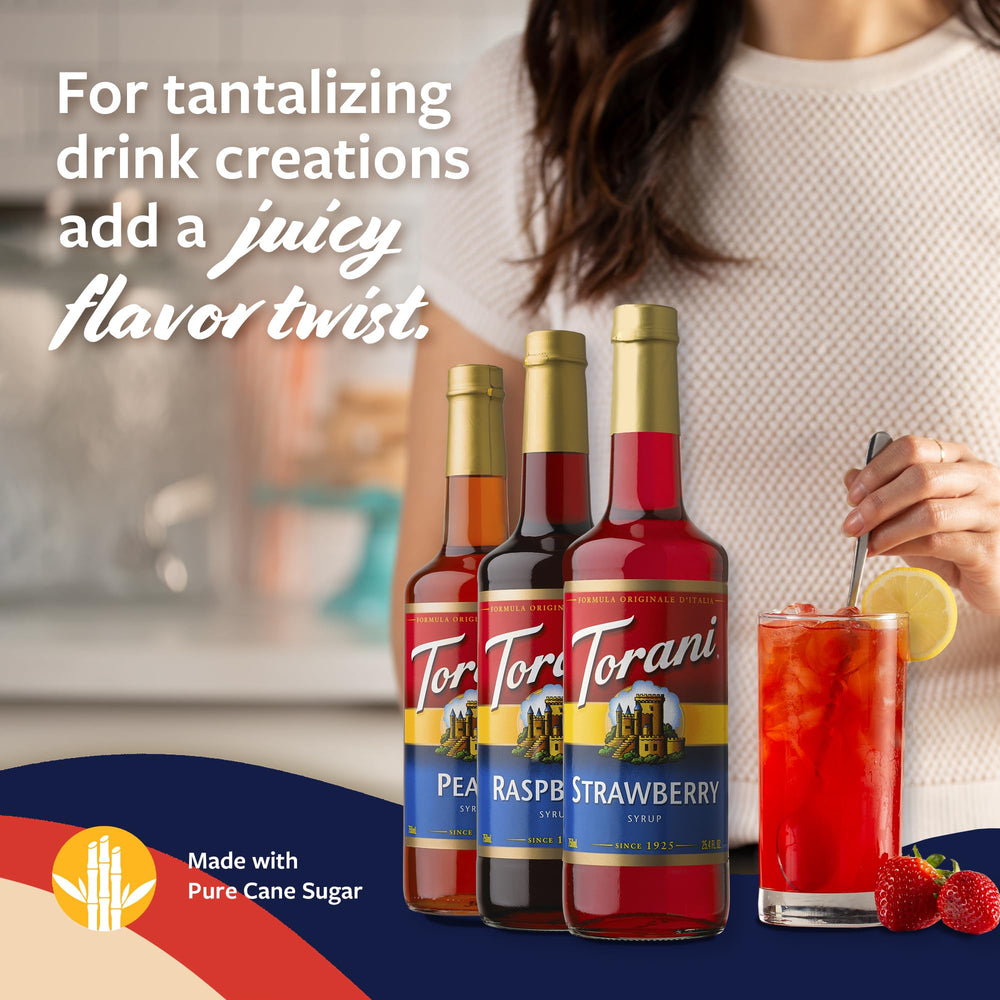 Torani raspberry syrup bottle with pump for bold sodas.