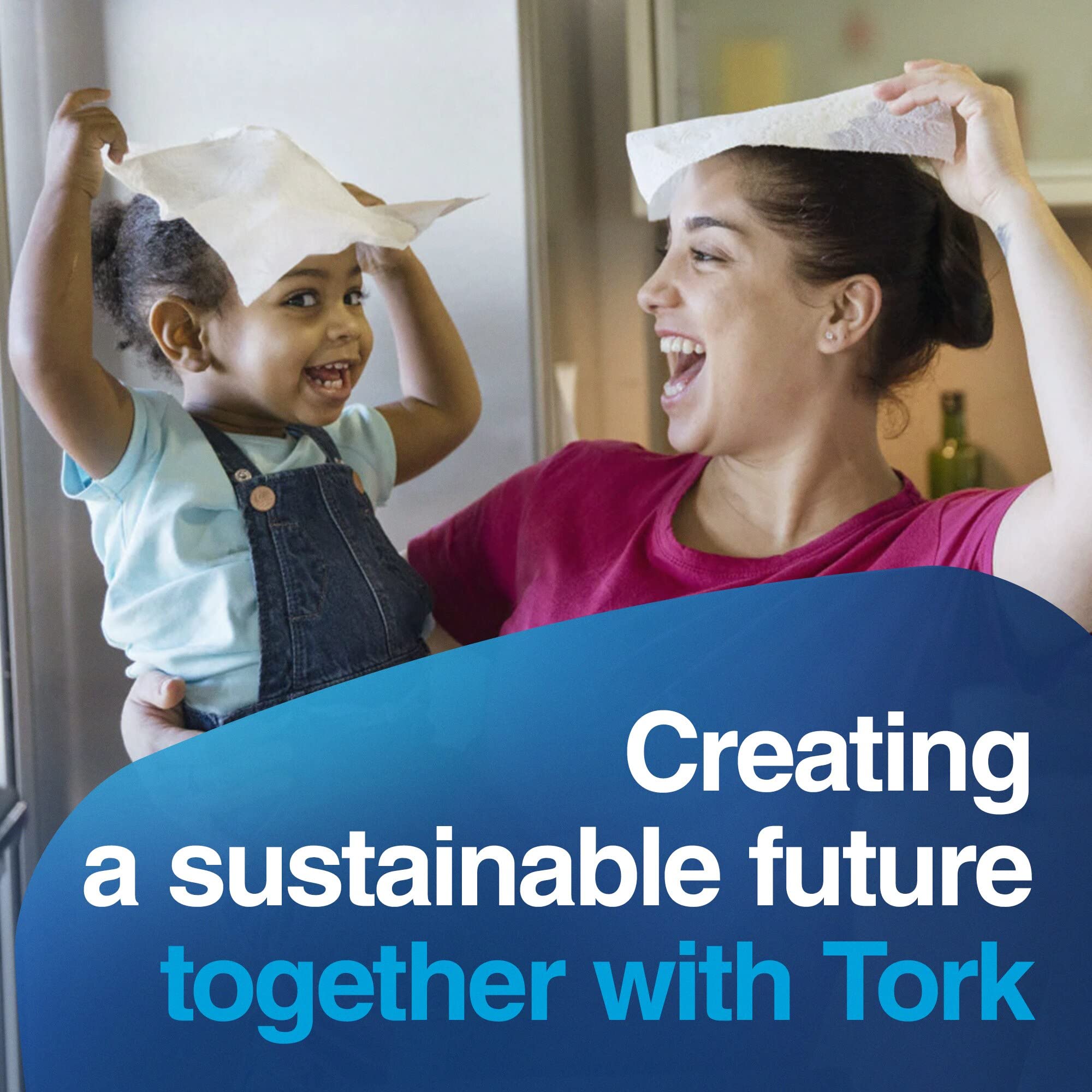 Tork Handi-Size roll towel white rolled spool showing long roll length