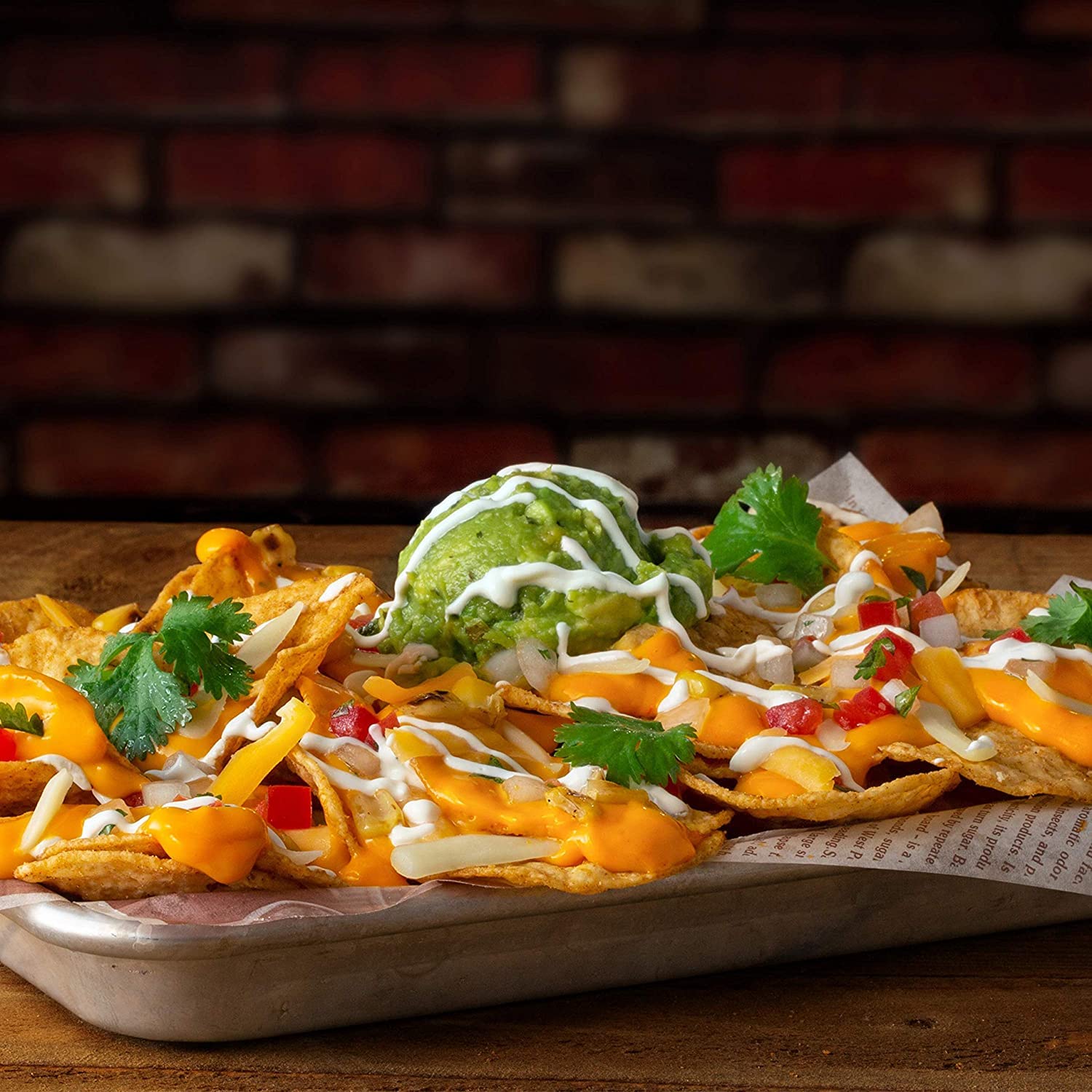 Tostitos Nacho Cheese Dip with chips for quick snacking.
