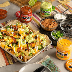 Tostitos Nacho Cheese Dip close-up shows smooth, inviting texture.
