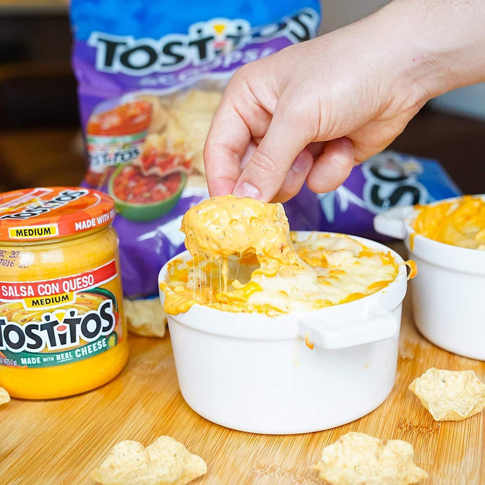 Tostitos Queso Variety Pack party table setup with chips and dips