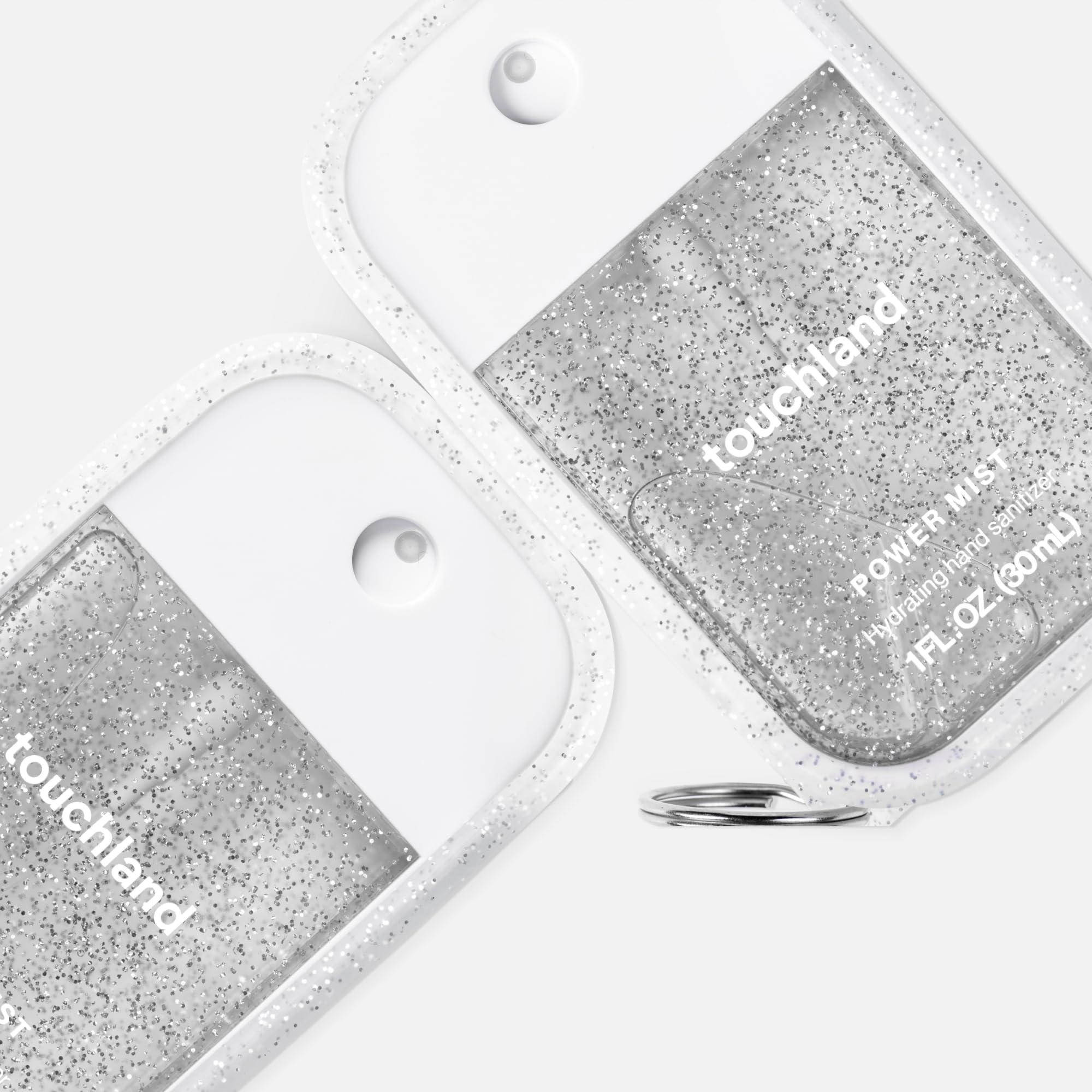 Touchland Frosted Sparkle case clip attachment keeps sanitizer accessible on bags