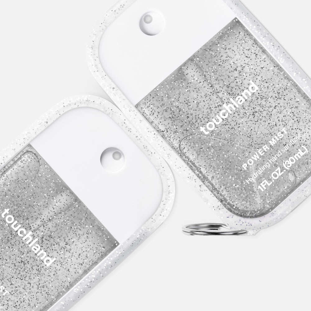 Touchland Frosted Sparkle case clip attachment keeps sanitizer accessible on bags