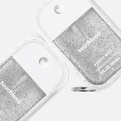 Touchland Frosted Sparkle case clip attachment keeps sanitizer accessible on bags