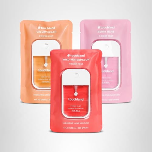Touchland Juicy Trio in use, hands refreshed after spray.