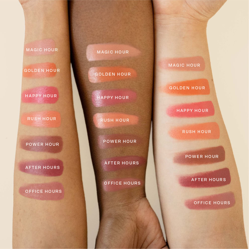 Tower 28 BeachPlease lip tint on lips in rosy nude shade.