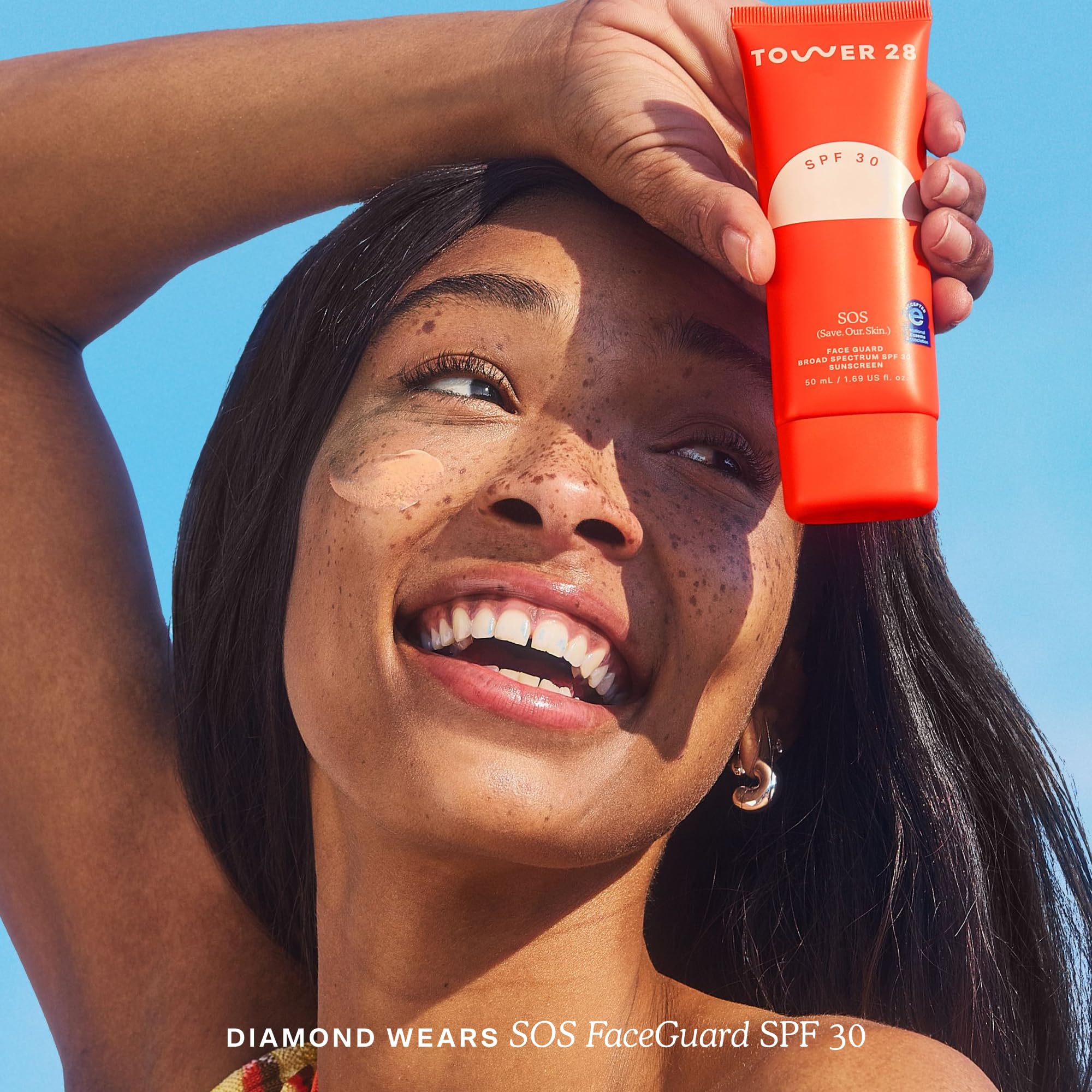 Tower 28 SOS FaceGuard bottle closeup highlighting creamy mineral texture