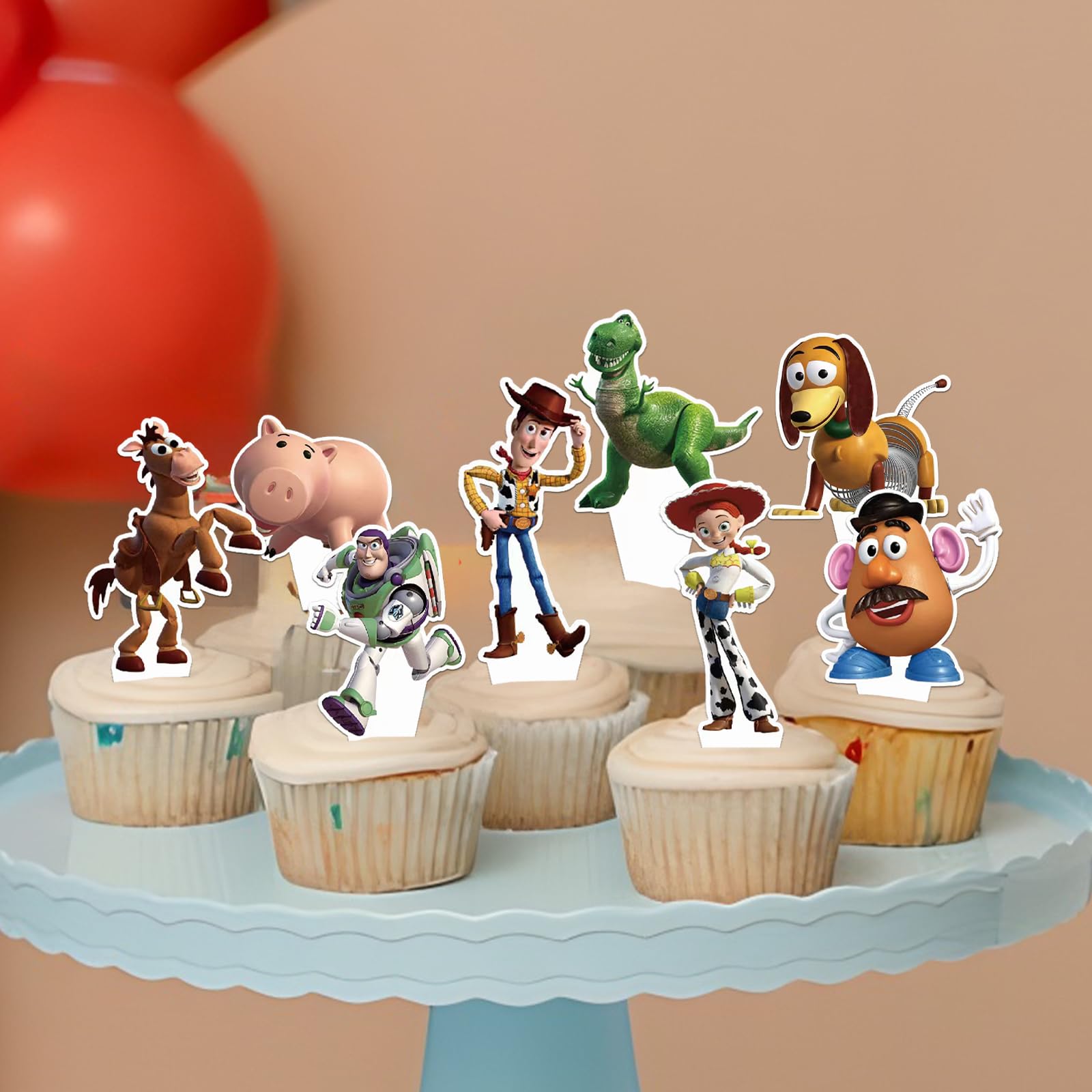 Toy Inspired Story Cupcake Toppers on the party table as decor