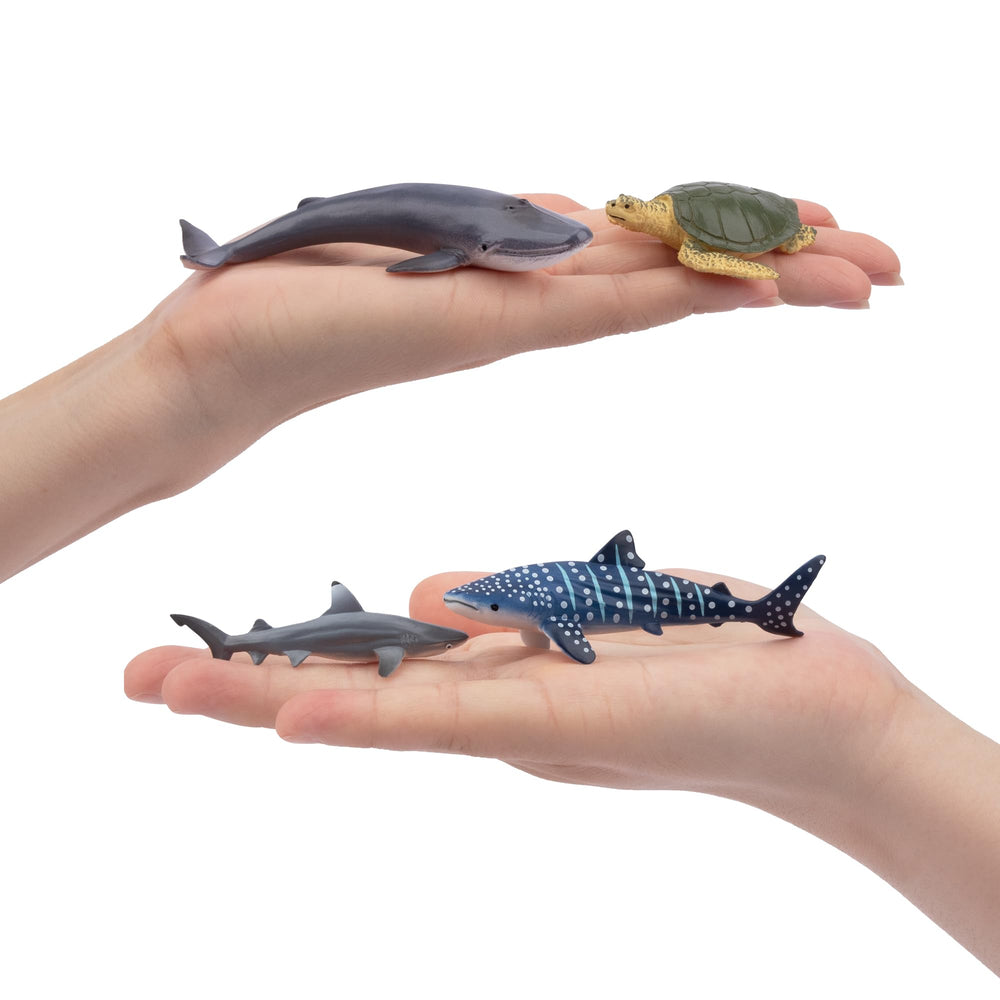 Toymany ocean cake toppers for a playful party theme.