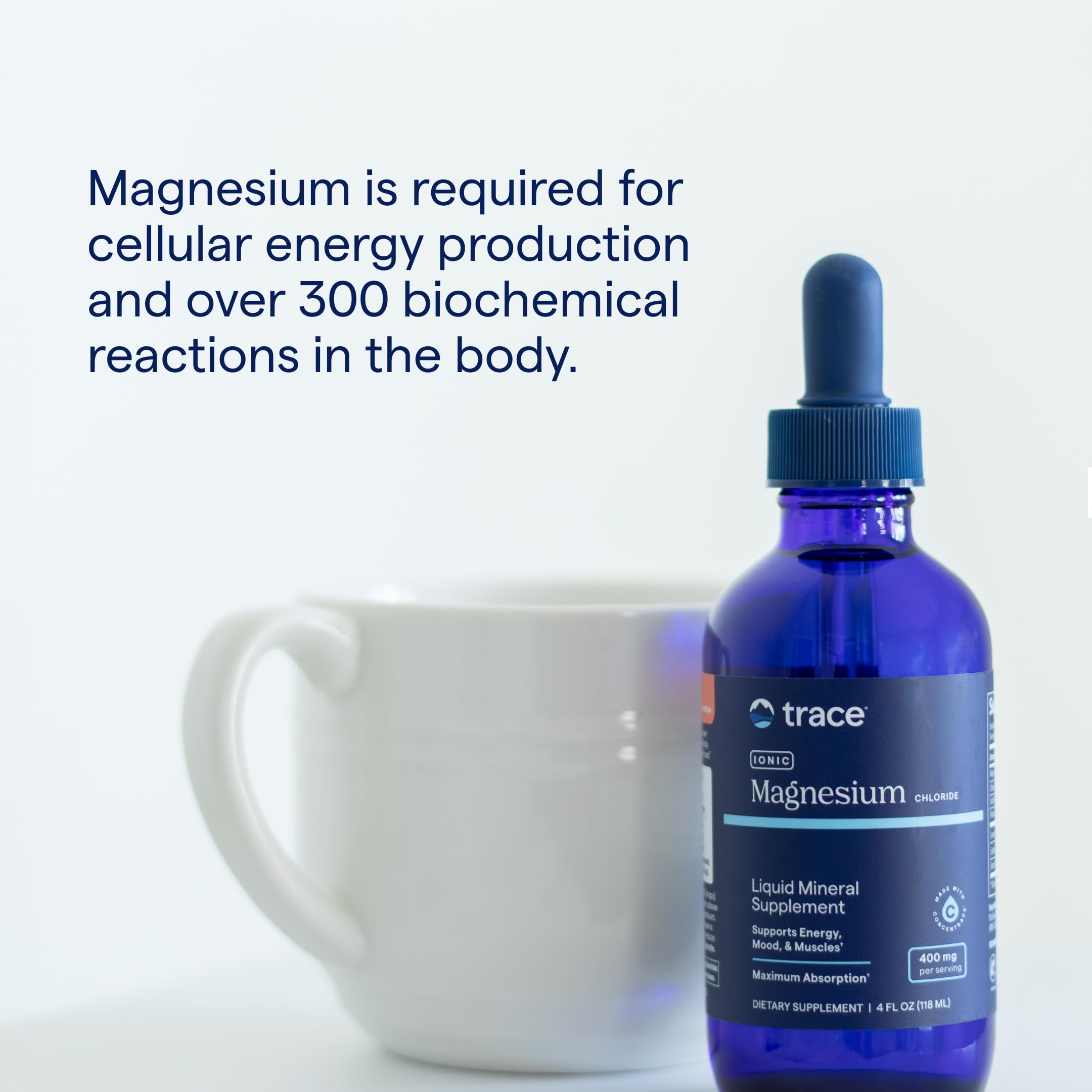 Trace Minerals Ionic Magnesium in use with a glass of water