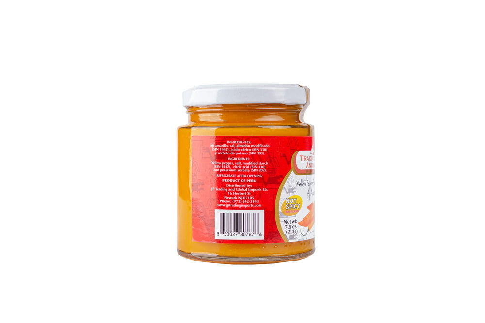 Tradiciones Andinas yellow pepper paste served over a dish for Peruvian flair
