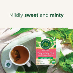 Traditional Medicinals pregnancy tea cup with steam for a calming ritual.
