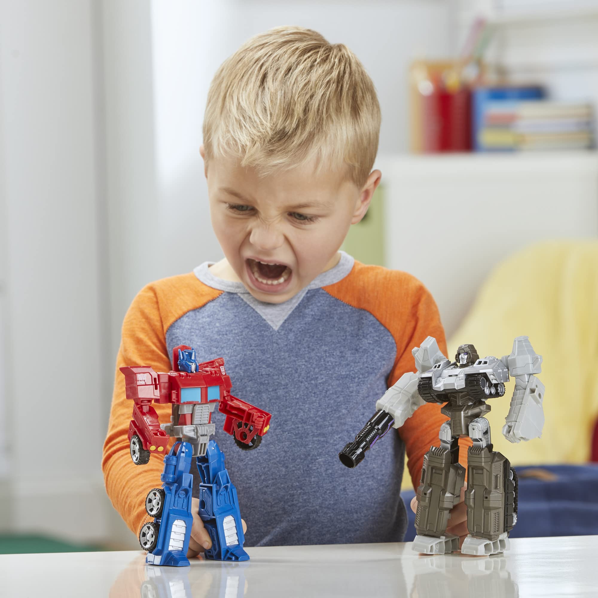Transformers 7-inch scale Optimus Prime Megatron figures for shared play.