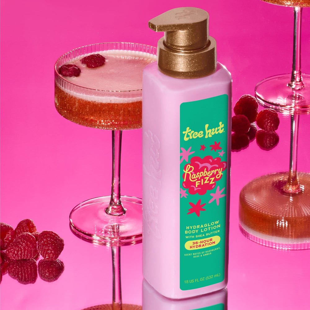 Raspberry Fizz fragrance swirl with rose petals and amber notes
