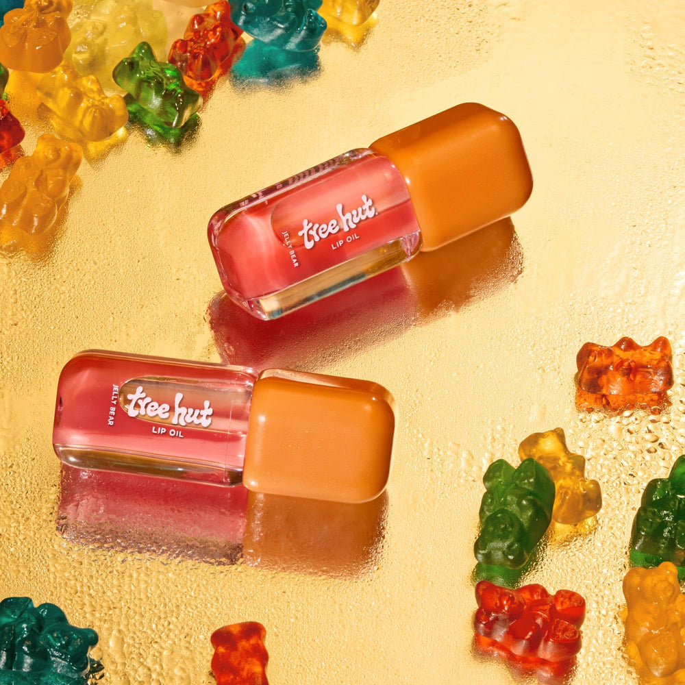 Tree Hut Jelly Bear lip oil color swatch on lips for a sheer tint