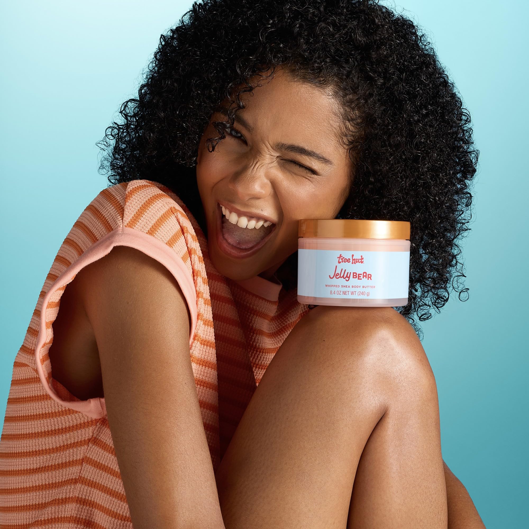 Tree Hut candy-scent orange lime raspberry bottle emits refreshing citrus notes for daily use.