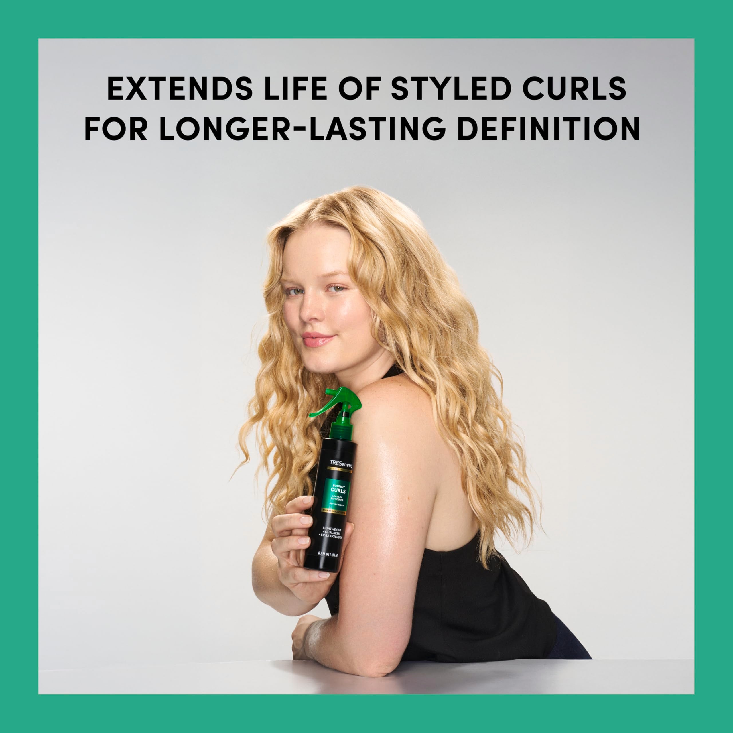 Mist-on TRESemmé Bouncy Curls Leave-In Refresher for restyling between washes.