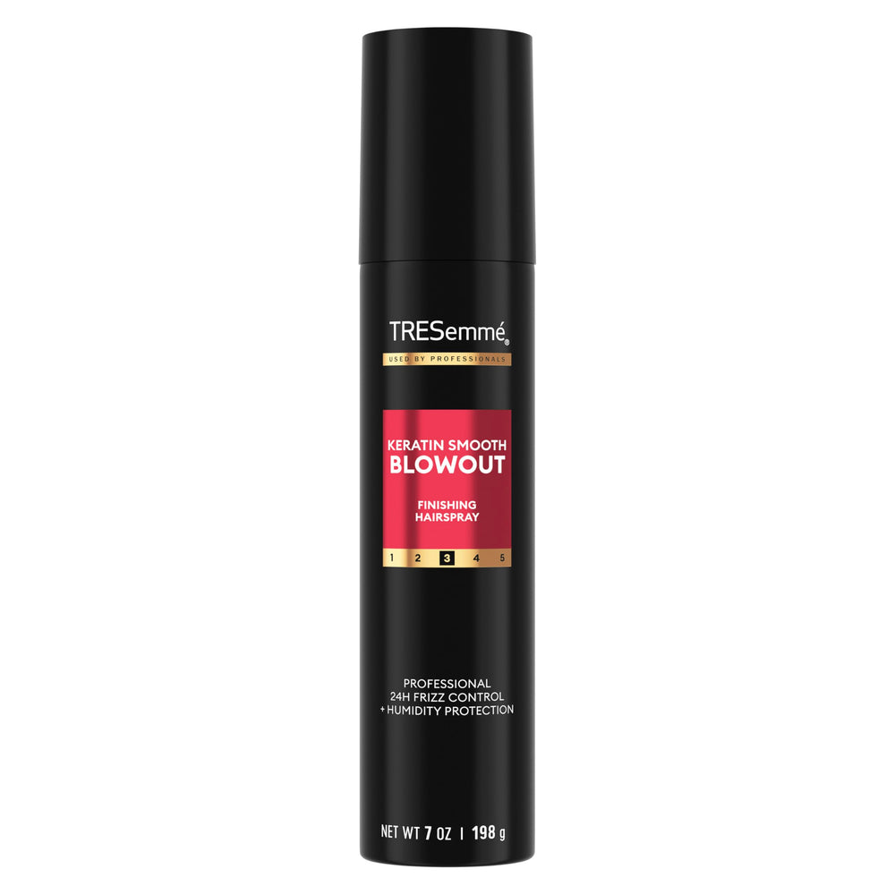 Tresemme Keratin Smooth Blowout Finishing Spray bottle on vanity delivering weightless hold and frizz control.