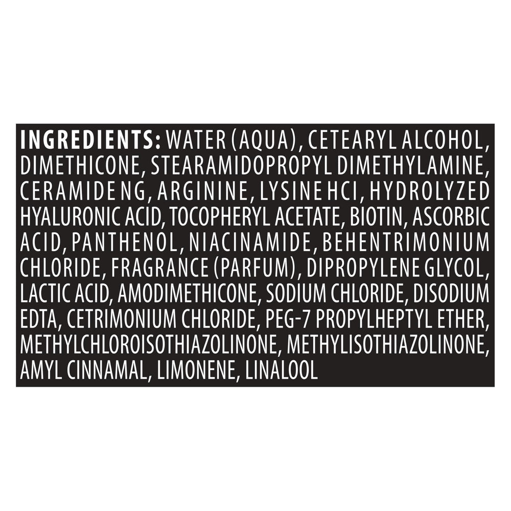 Tresemme Rich Moisture Conditioner on bathroom counter with bottle.