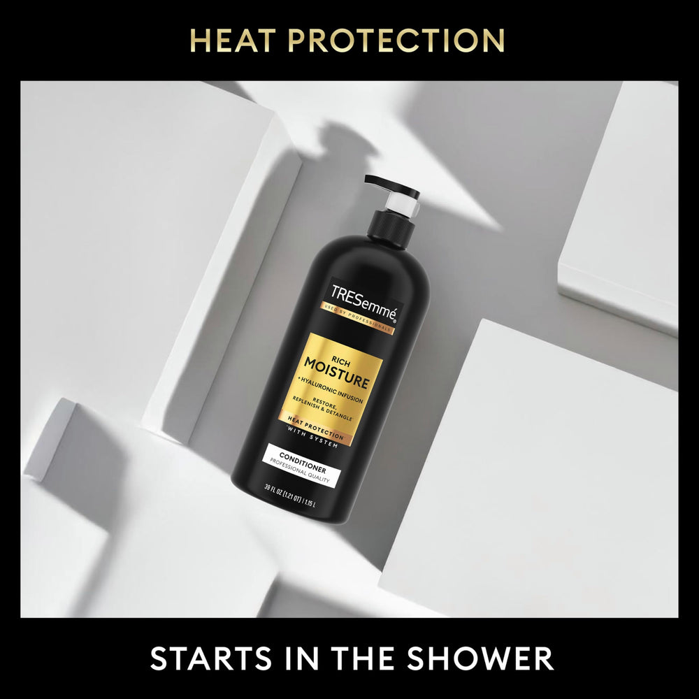 New packaging design for Tresemme Rich Moisture Conditioner on display.