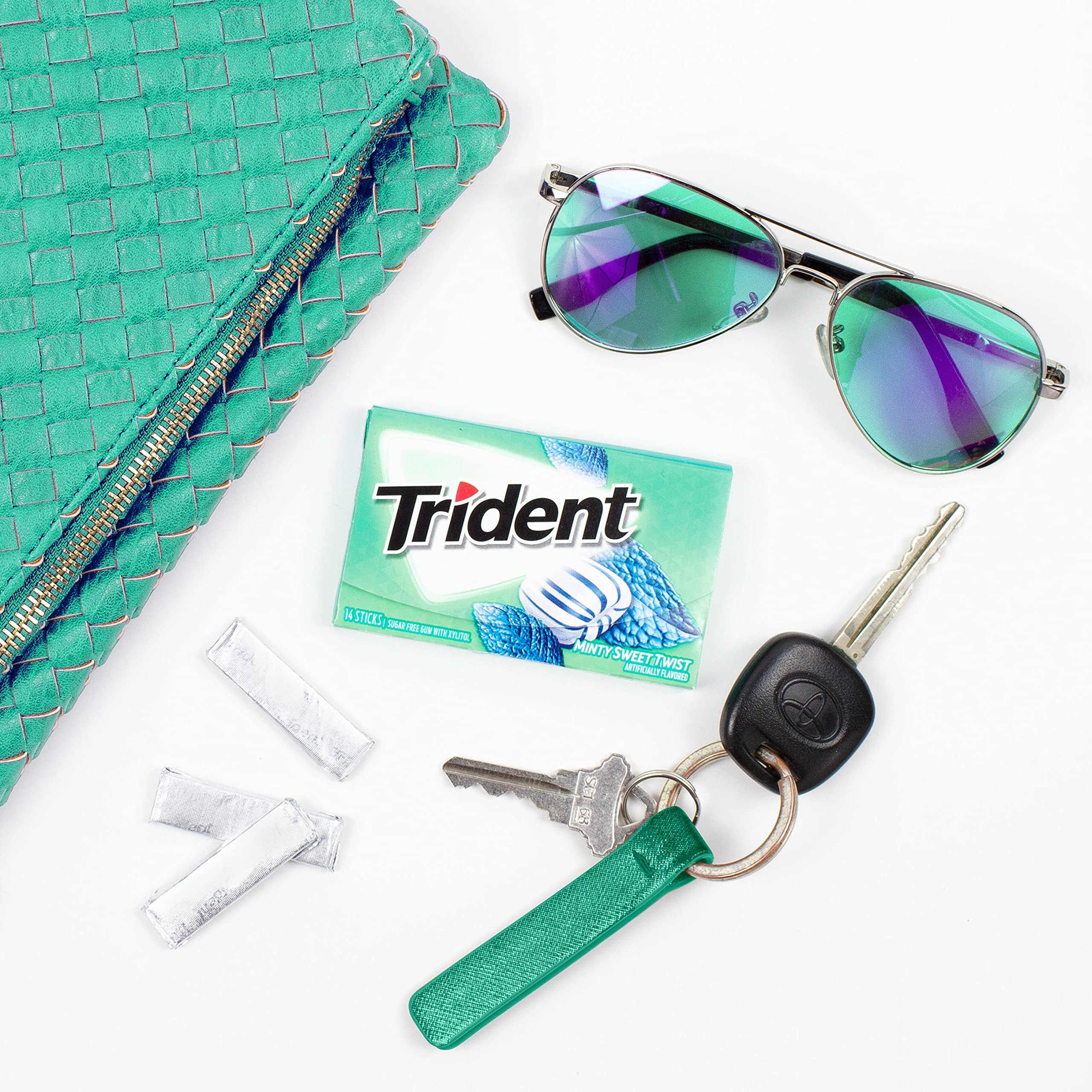 Trident travel-friendly gum in compact packaging for car use.