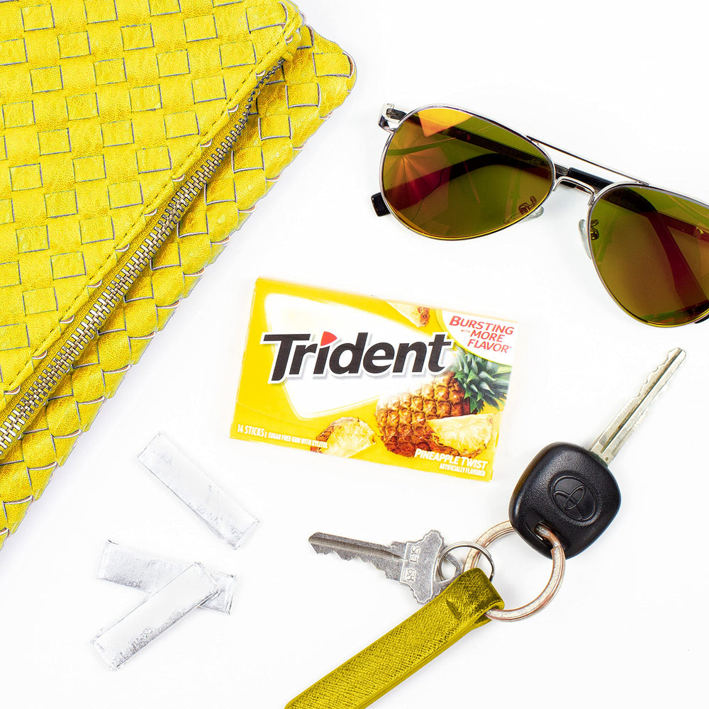 Trident Pineapple Twist gum individually wrapped for portability.