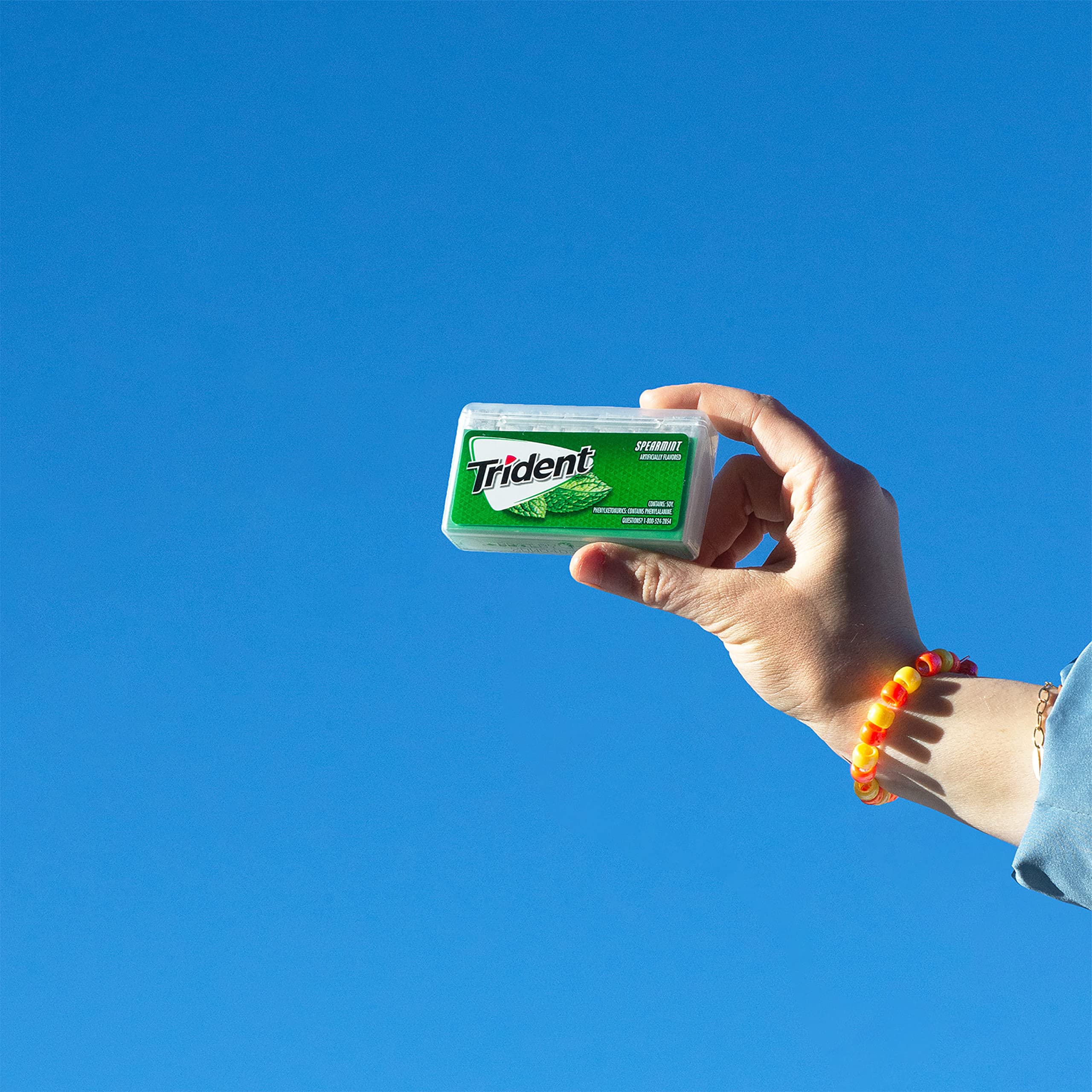 On-the-go fresh breath with Trident Spearmint sugar-free gum.