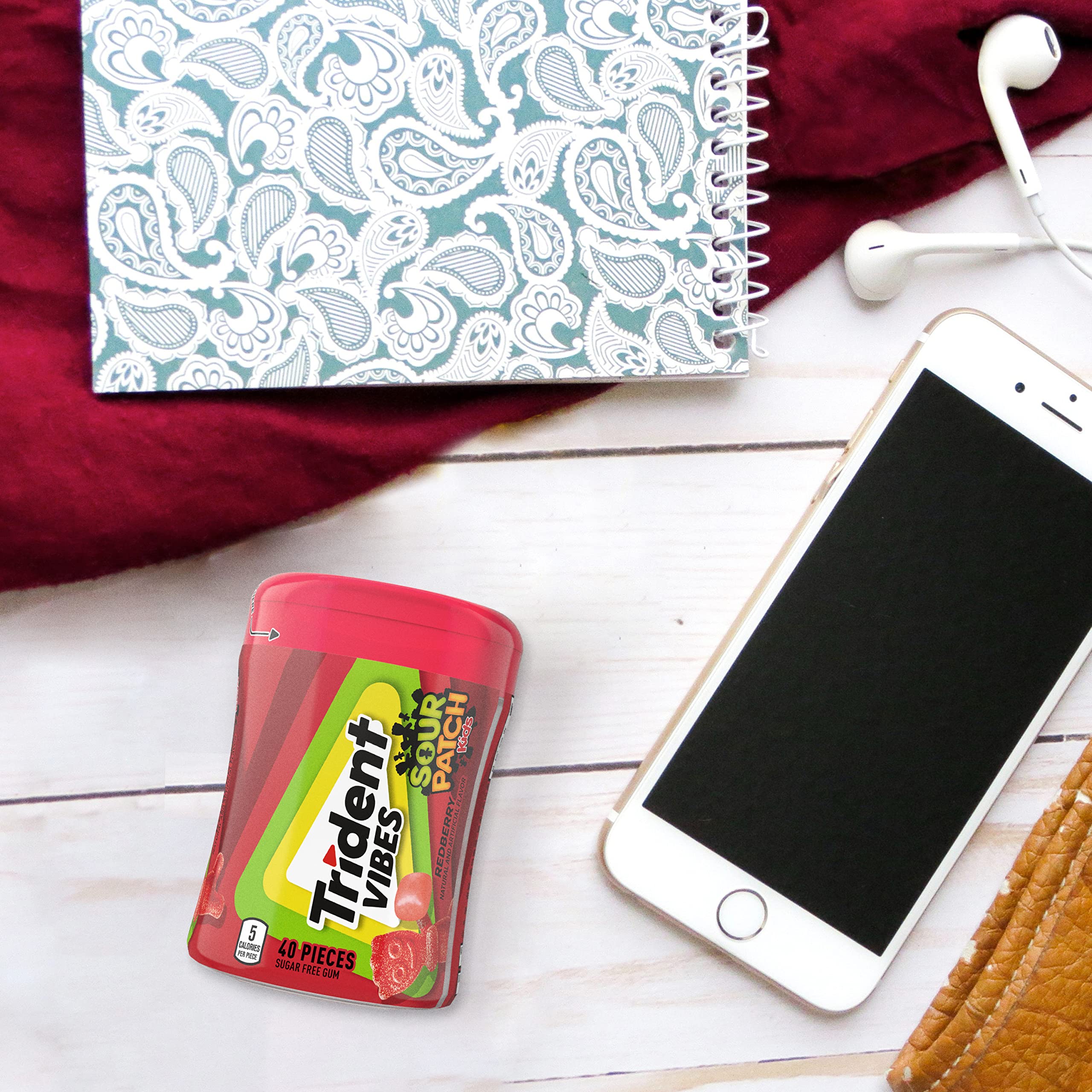 Trident Vibes bottle in car console for a road trip refreshment.