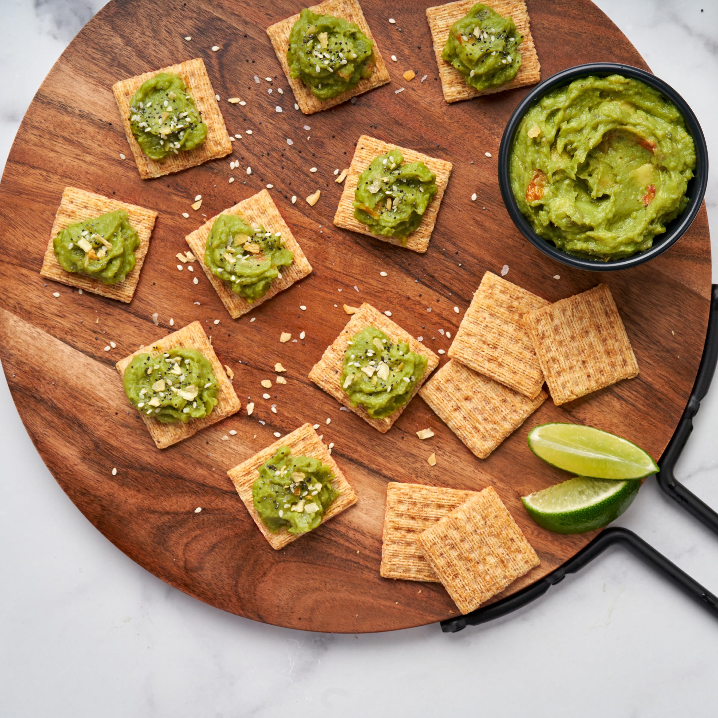 Triscuit pairs with cheese and fruit for quick toppings