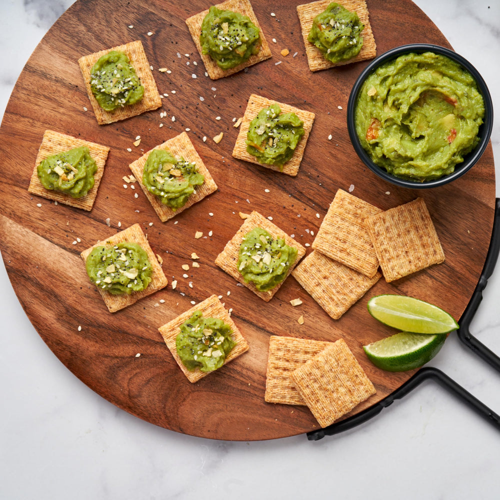 Triscuit pairs with cheese and fruit for quick toppings
