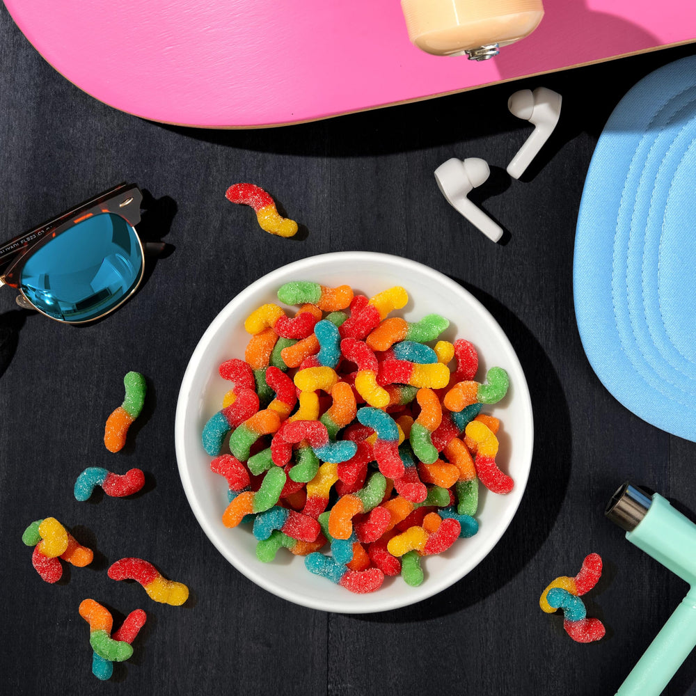 Halloween table featuring Trolli Mini Sour Brite Crawlers