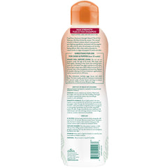 TropiClean thick foamy lather covers a dog's coat during a bath.