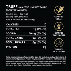 TRUFF Jalapeño Lime Hot Sauce ingredients close-up with truffles and peppers.