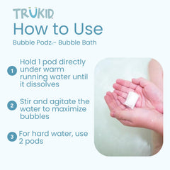 TruKid Bubble Podz dissolving pod releasing rich lather in running water.