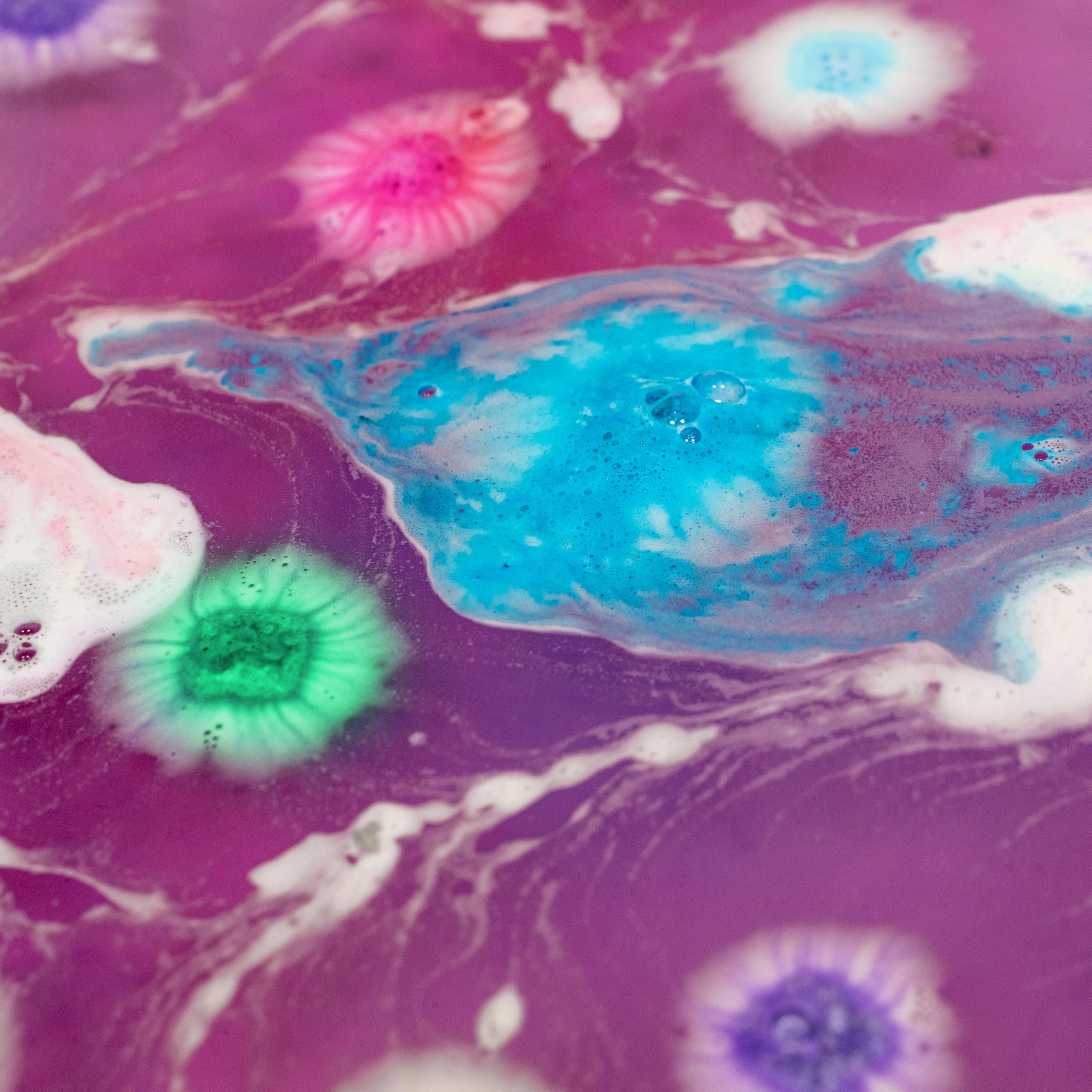 Tub Works Lil' Bursts bombs dissolve to tint tub water without staining.