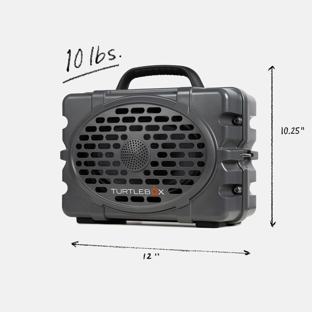Turtlebox Original Gen 3 on beach scene showing durable outdoor speaker for sun and sand