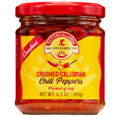TuttoCalabria crushed Calabrian chili jar close-up for bold red heat and fresh aroma.