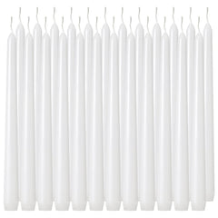 Tuyai 10-inch tall white taper candle on dining table for ambience