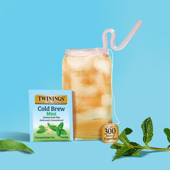 Twinings cold brewed tea poured into a glass over ice.