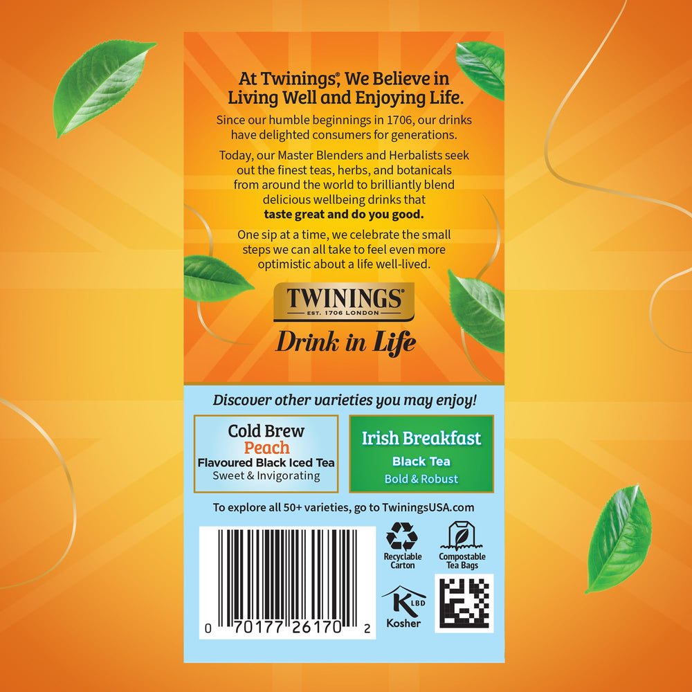 Twinings mint green tea bags close-up with peppermint leaves and bright aroma.