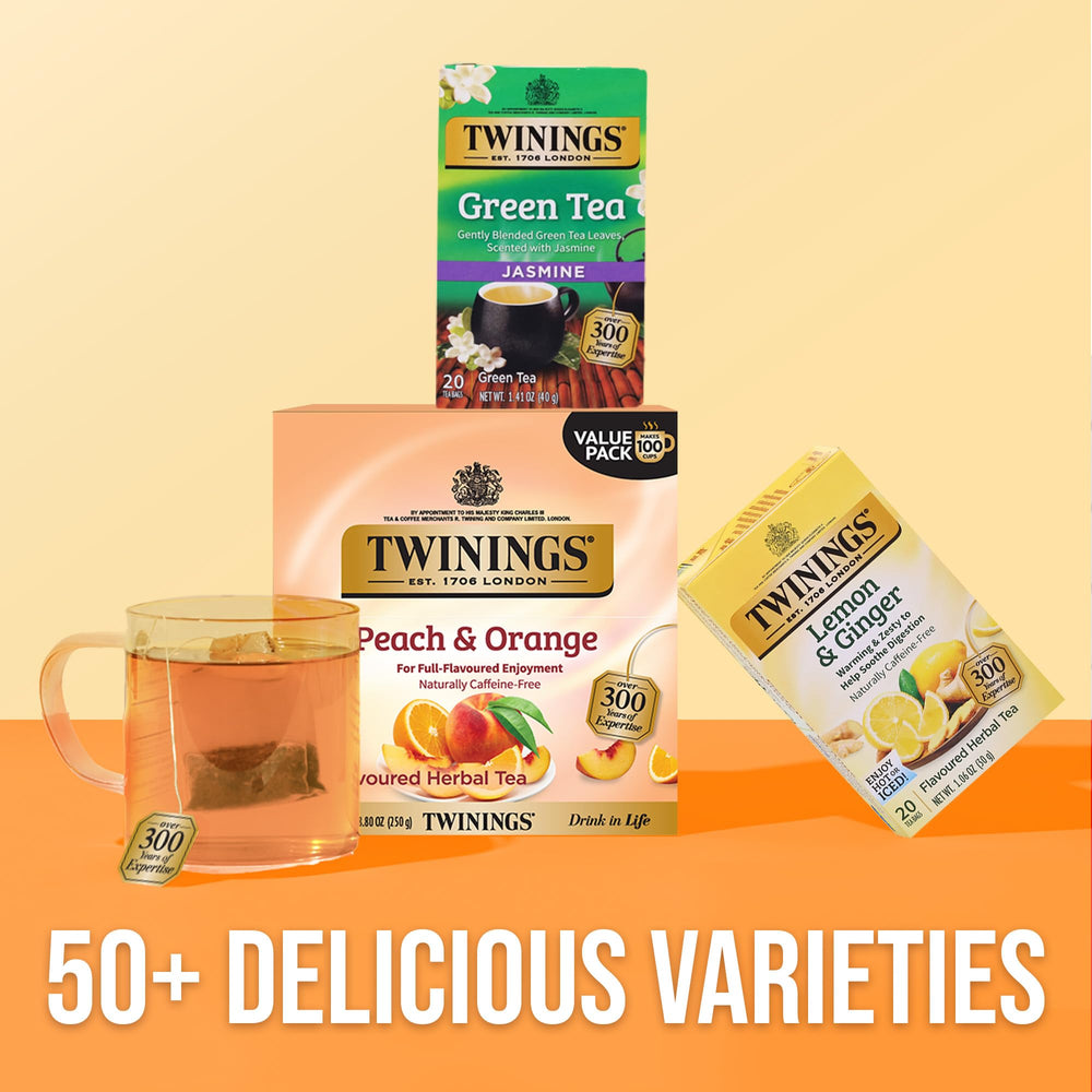 Twinings peach-orange tea iced glass—refreshing beverage option for sunny days.
