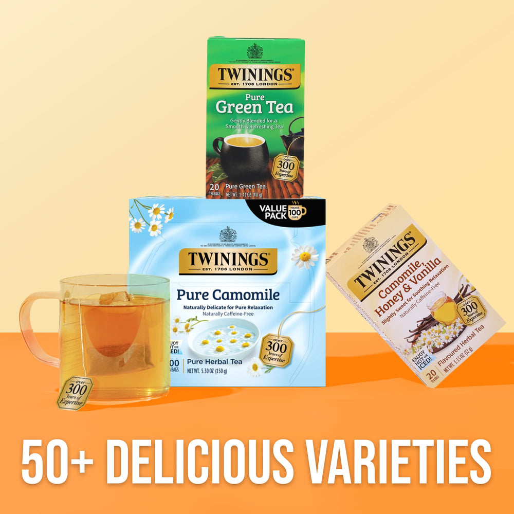 Twinings camomile tea brewed, clear golden infusion ready to sip.