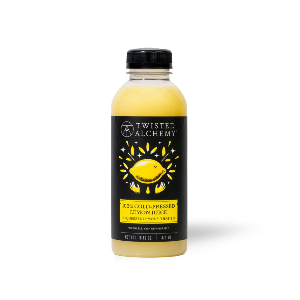 Twisted Alchemy lemon juice bottle pour shows fresh citrus for vibrant cocktails.