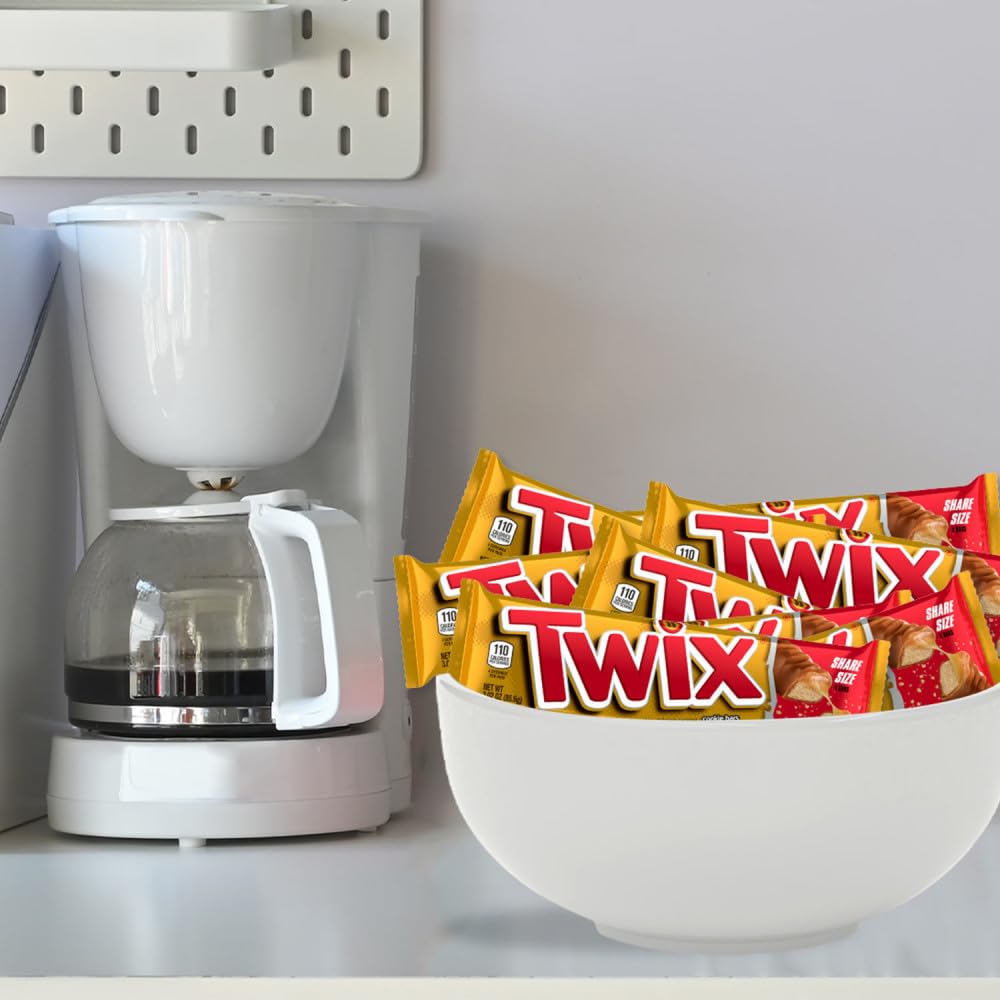 TWIX Caramel Cookie Bars set up for a cozy movie night