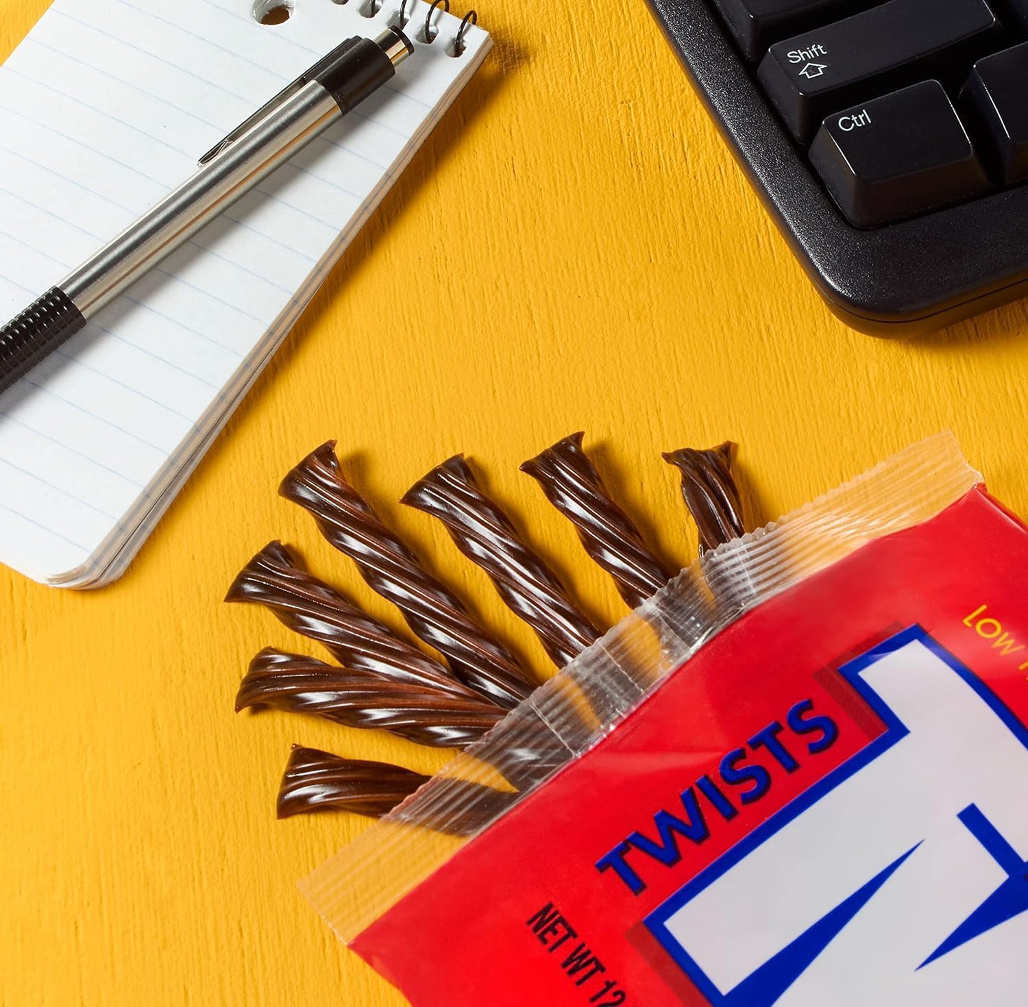 Twizzlers chocolate flavored twists on table during casual movie night setup