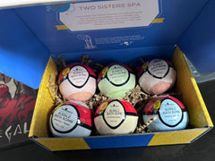 Two Sisters Poke Monster bath bomb showing surprise inside for kids' baths and collectable beasts.