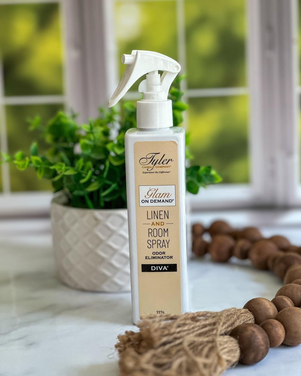 Tyler Candle Company High Maintenance aroma enhances living spaces with florals and woods.